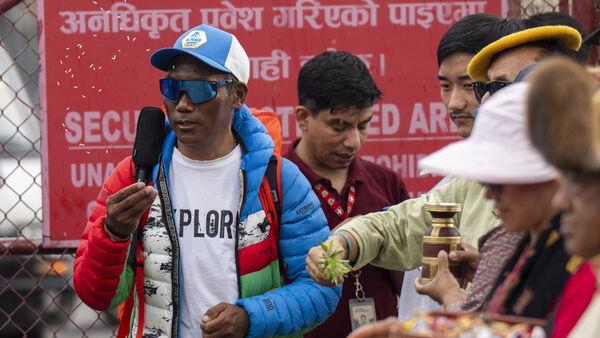 Record-holding Sherpa guide concerned about rubbish on Everest’s higher camps